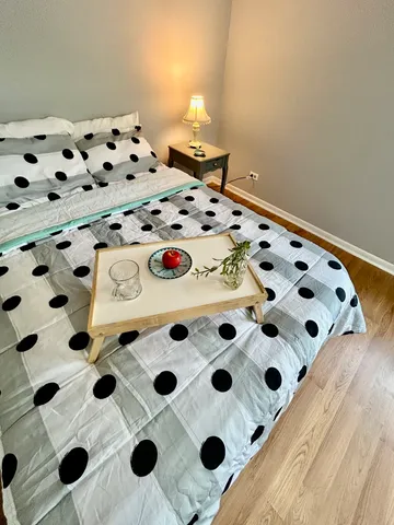 a bathroom with a shower and a sink