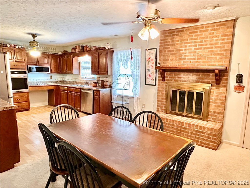 815 Whispering Pines Road Fayetteville, NC 28311 - Photo 14 of 38 a dining room with furniture and window