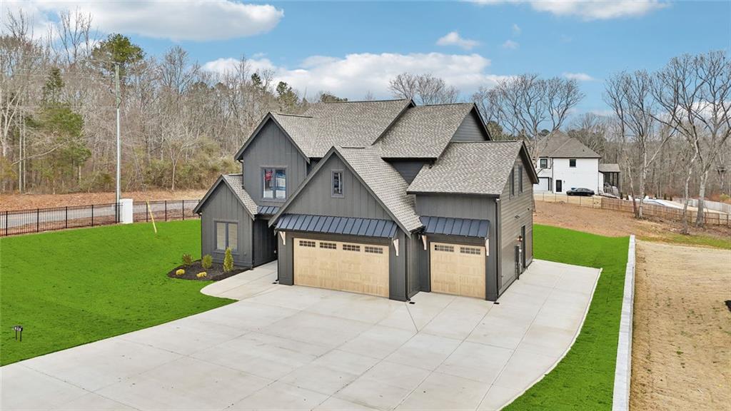 24 Rocking Wood Drive Auburn, GA 30011 - Photo 10 of 101 a front view of a house with garden