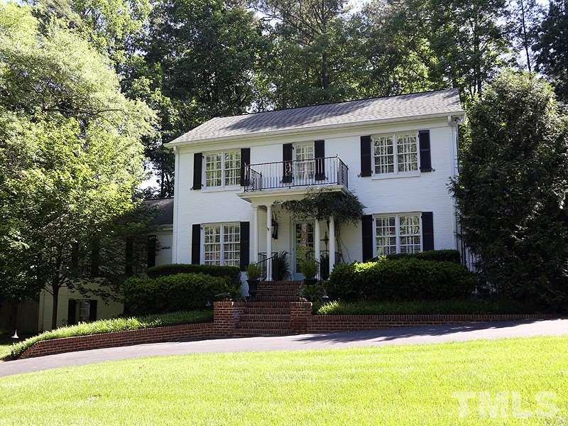 600 Marlowe Road Raleigh, NC 27609 - Photo 1 of 18 a front view of a house with yard and green space