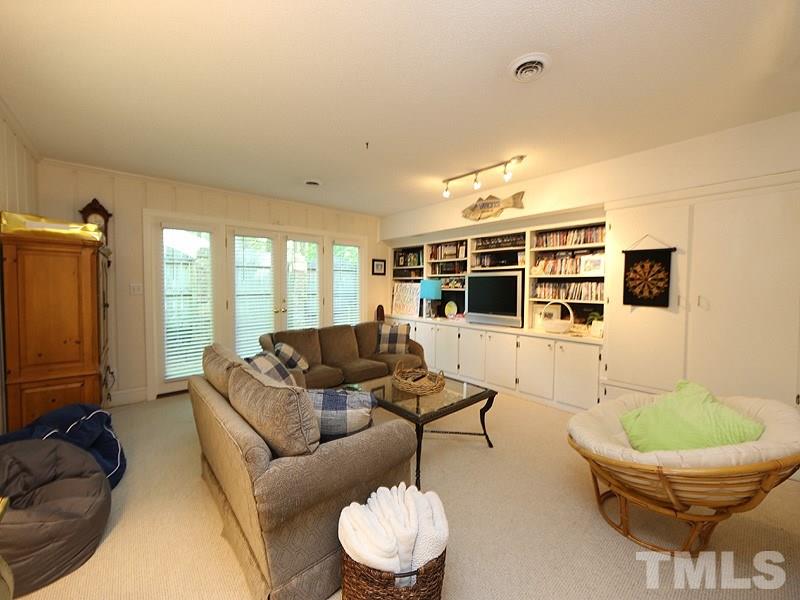 600 Marlowe Road Raleigh, NC 27609 - Photo 15 of 18 a living room with furniture and a large window