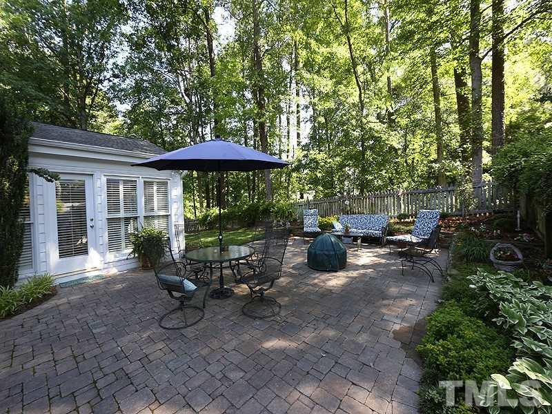 600 Marlowe Road Raleigh, NC 27609 - Photo 17 of 18 a view of a backyard with sitting area and garden