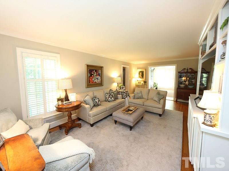 600 Marlowe Road Raleigh, NC 27609 - Photo 4 of 18 a living room with furniture and a large window