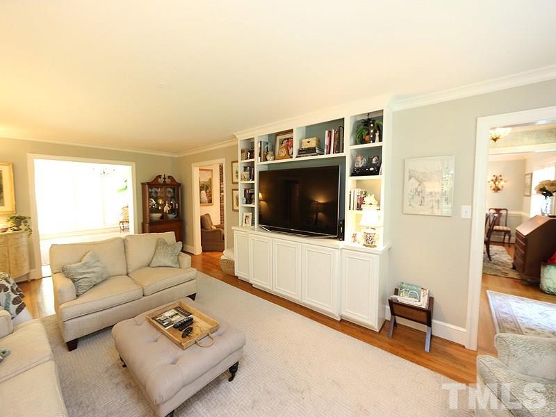 600 Marlowe Road Raleigh, NC 27609 - Photo 5 of 18 a living room with furniture and a flat screen tv