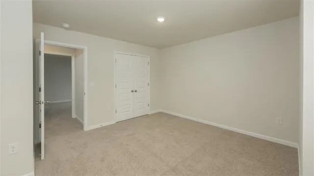 an empty room with an entryway