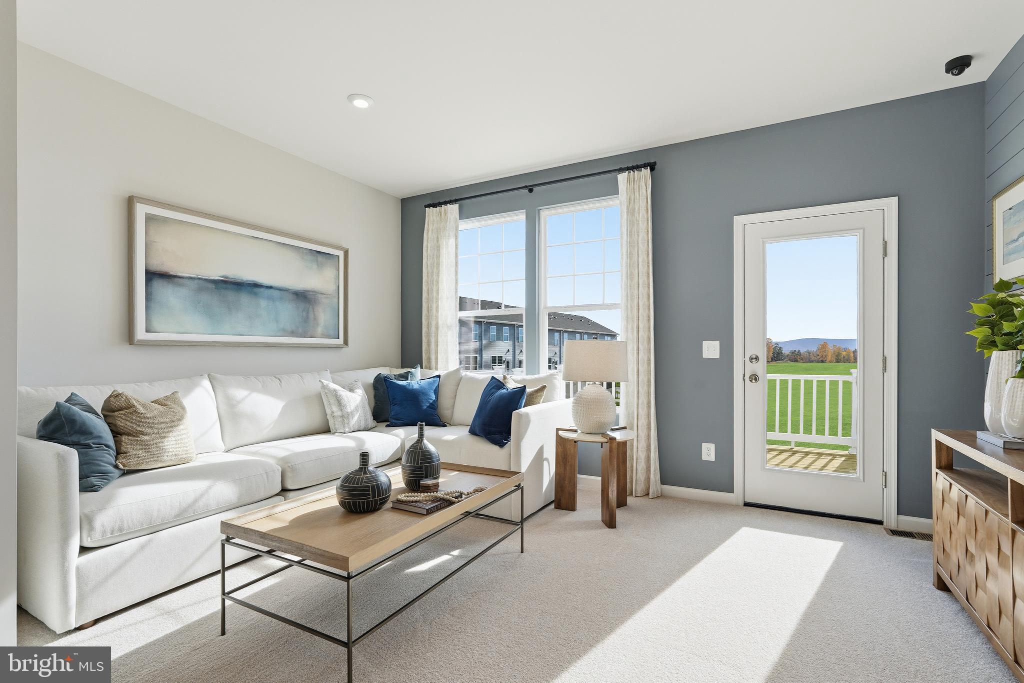 431 Presidents Pointe Avenue, Unit 450 Ranson, WV 25438 - Photo 54 of 87 Hastings- Great Room staged