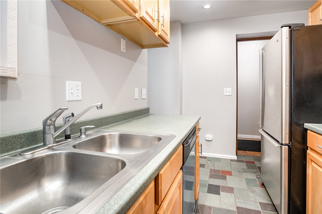 111 Gregory Street Rochester, NY 14620 - Photo 21 of 45 Kitchen View to Hall Steps to Lower Level Bedroom