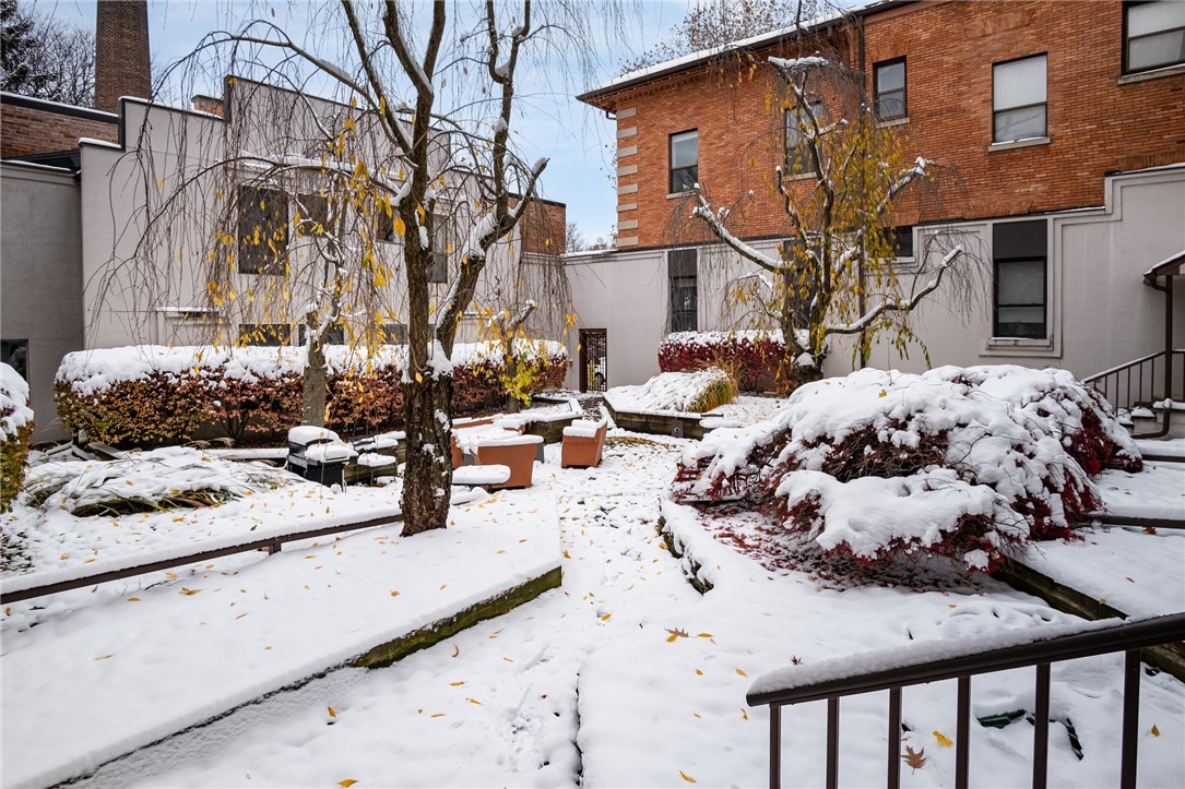 111 Gregory Street Rochester, NY 14620 - Photo 41 of 45 Locked Exterior Gate to Courtyard