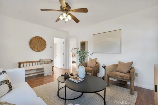 a kitchen with a stove a sink and a refrigerator