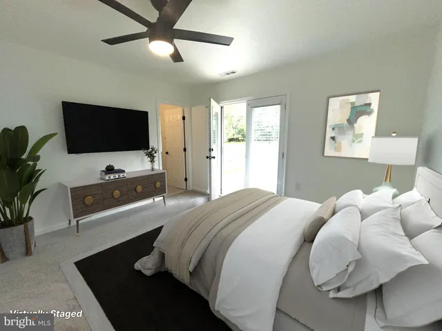 a view of a livingroom with a flat screen tv