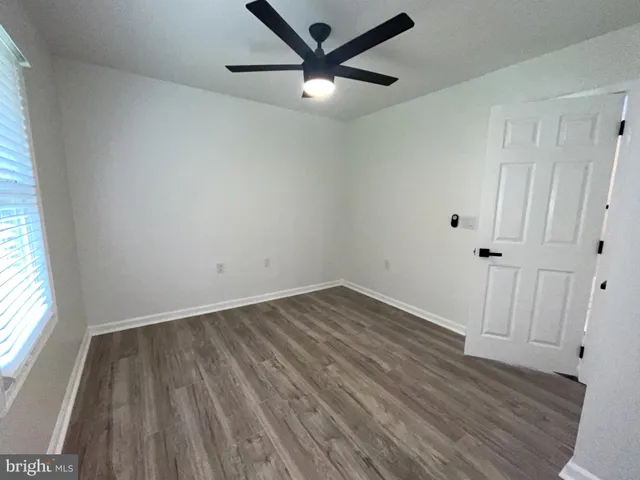 a room with pool table and flat screen tv