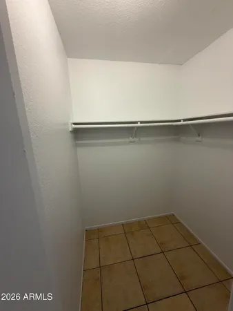 a view of a room with racks on the wall
