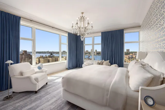 a view of a room with white walls