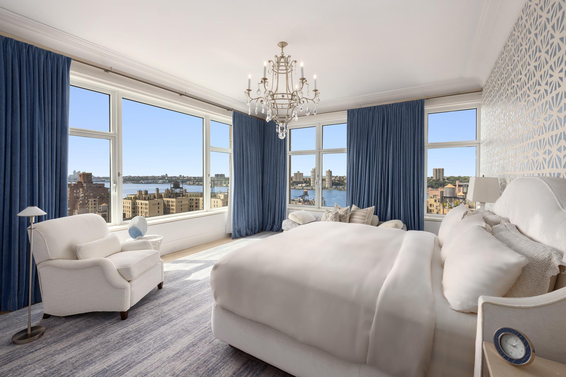 535 West End Avenue, Unit PH Manhattan, NY 10024 - Photo 11 of 19 a bedroom with bed and a large window