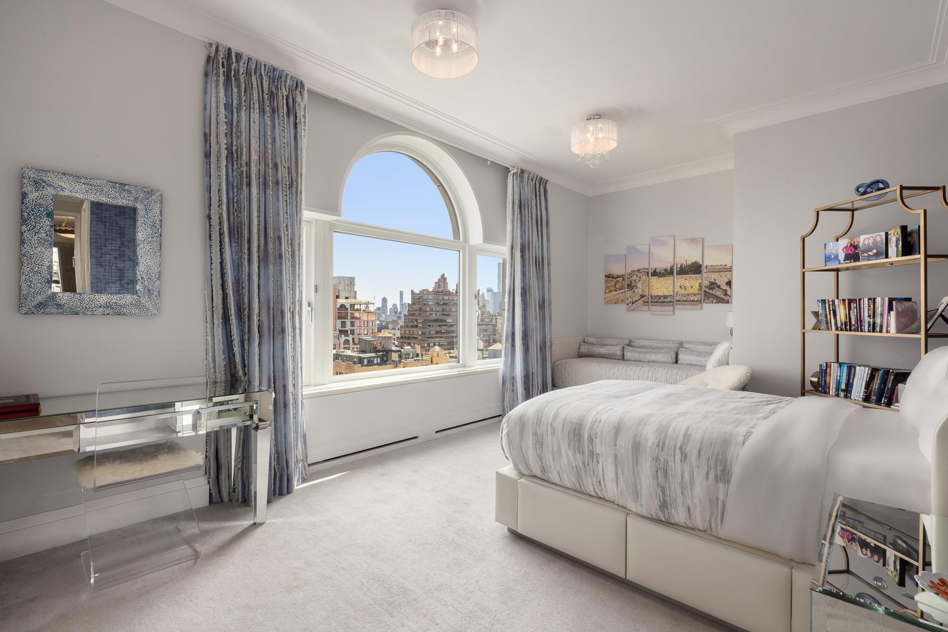 535 West End Avenue, Unit PH Manhattan, NY 10024 - Photo 15 of 19 a bedroom with a large bed and a window