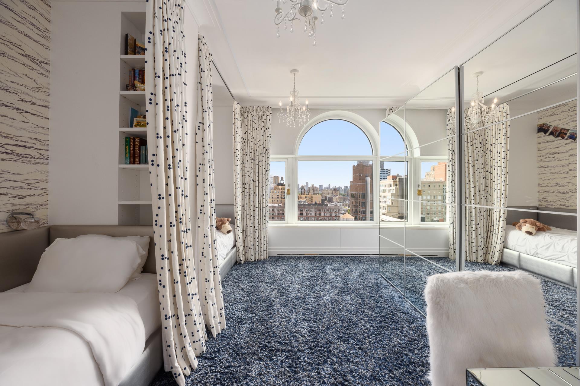535 West End Avenue, Unit PH Manhattan, NY 10024 - Photo 16 of 19 a living room with furniture and a large window