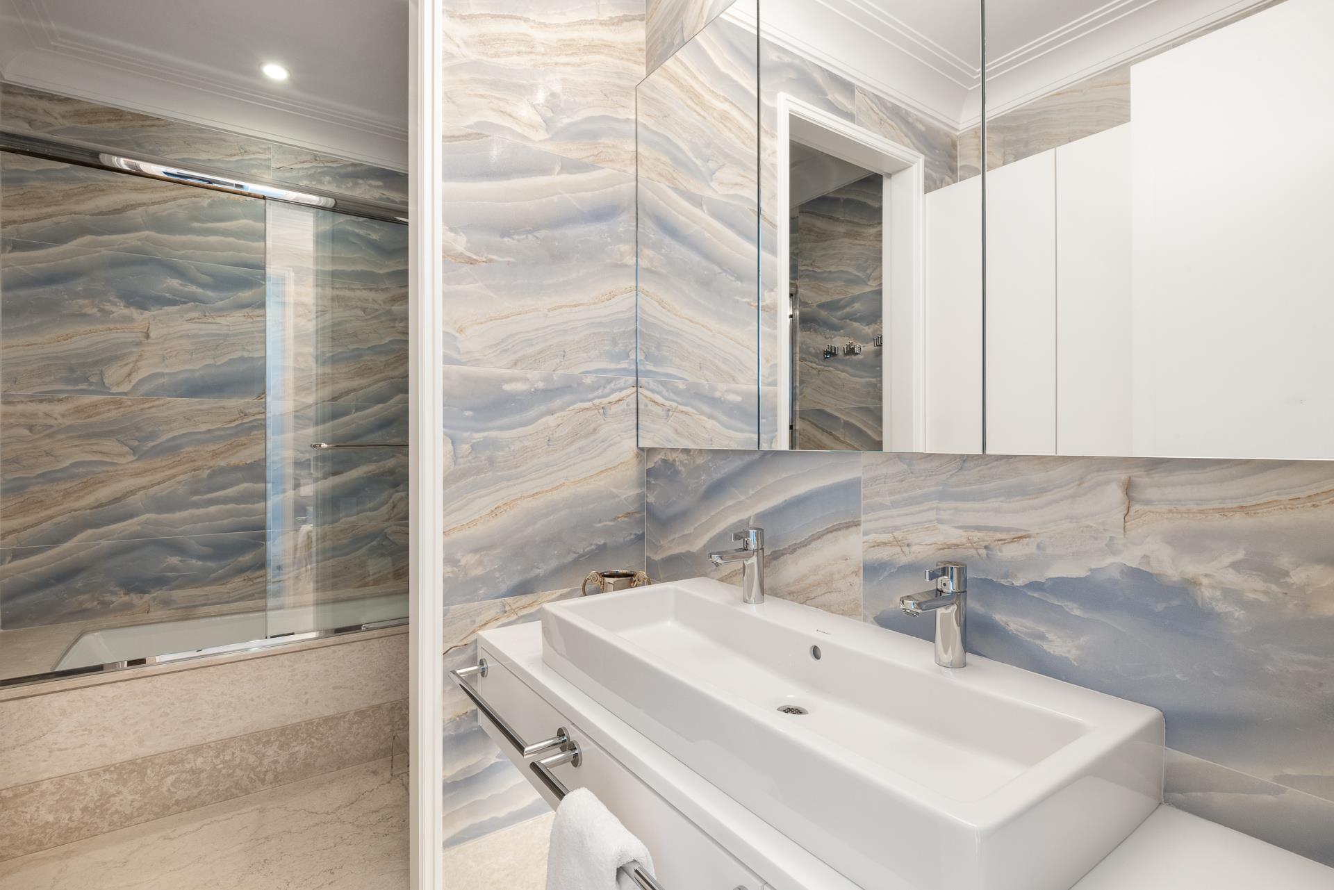 535 West End Avenue, Unit PH Manhattan, NY 10024 - Photo 18 of 19 a bathroom with a sink and a mirror