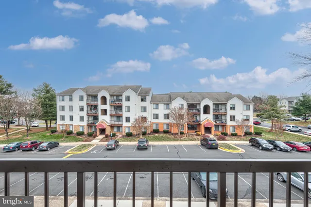 front view of a building with a yard