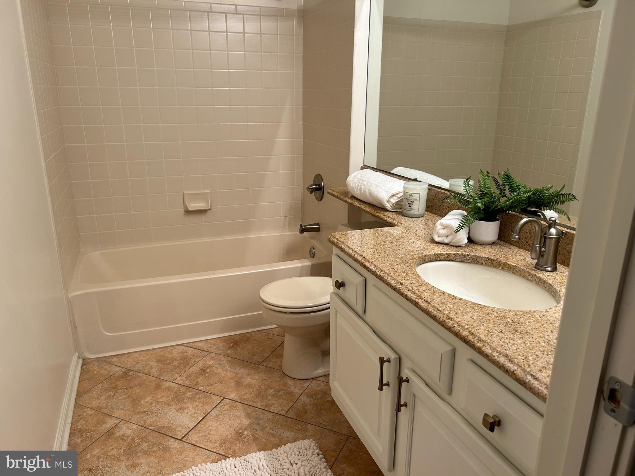 907 A Oliphant Lane Mount Laurel, NJ 08054 - Photo 14 of 23 a bathroom with a granite countertop sink toilet and shower