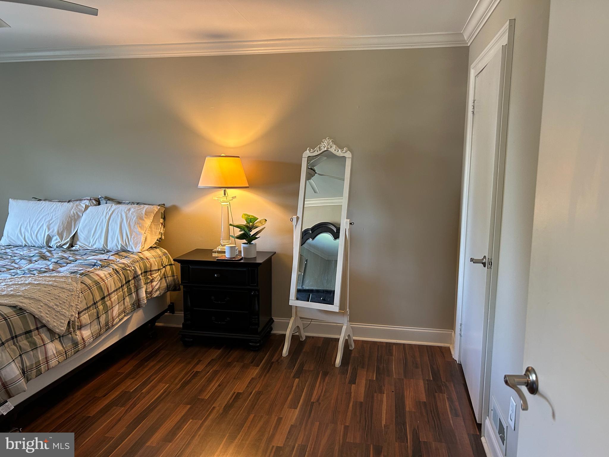 907 A Oliphant Lane Mount Laurel, NJ 08054 - Photo 15 of 23 a bedroom with a bed and a mirror