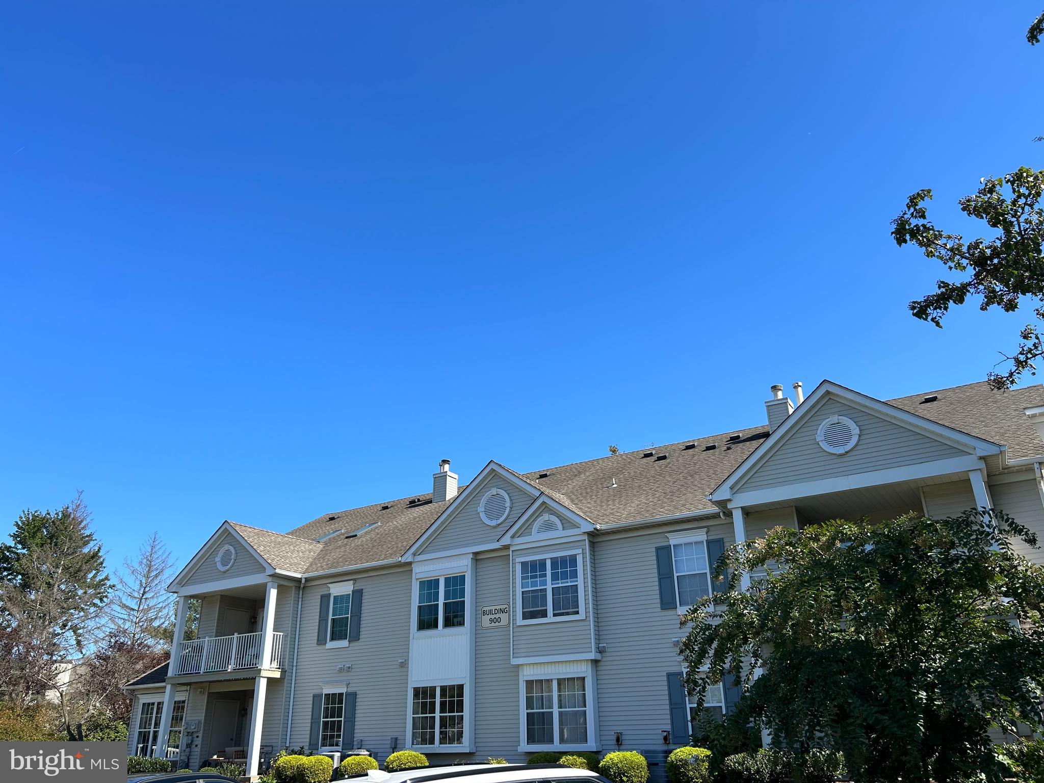 907 A Oliphant Lane Mount Laurel, NJ 08054 - Photo 22 of 23 a front view of a house with a yard