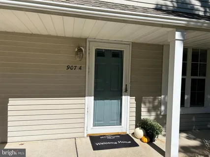 a view of a door and a window