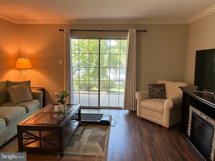 a very nice looking dining room with a table and chairs