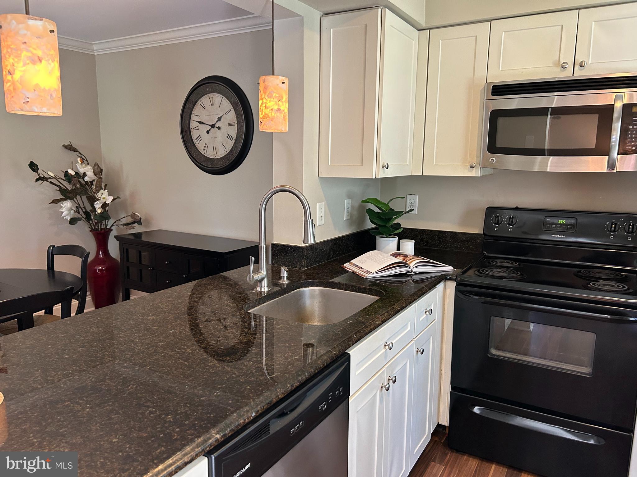 907 A Oliphant Lane Mount Laurel, NJ 08054 - Photo 8 of 23 a kitchen with stainless steel appliances granite countertop a sink a stove and cabinets
