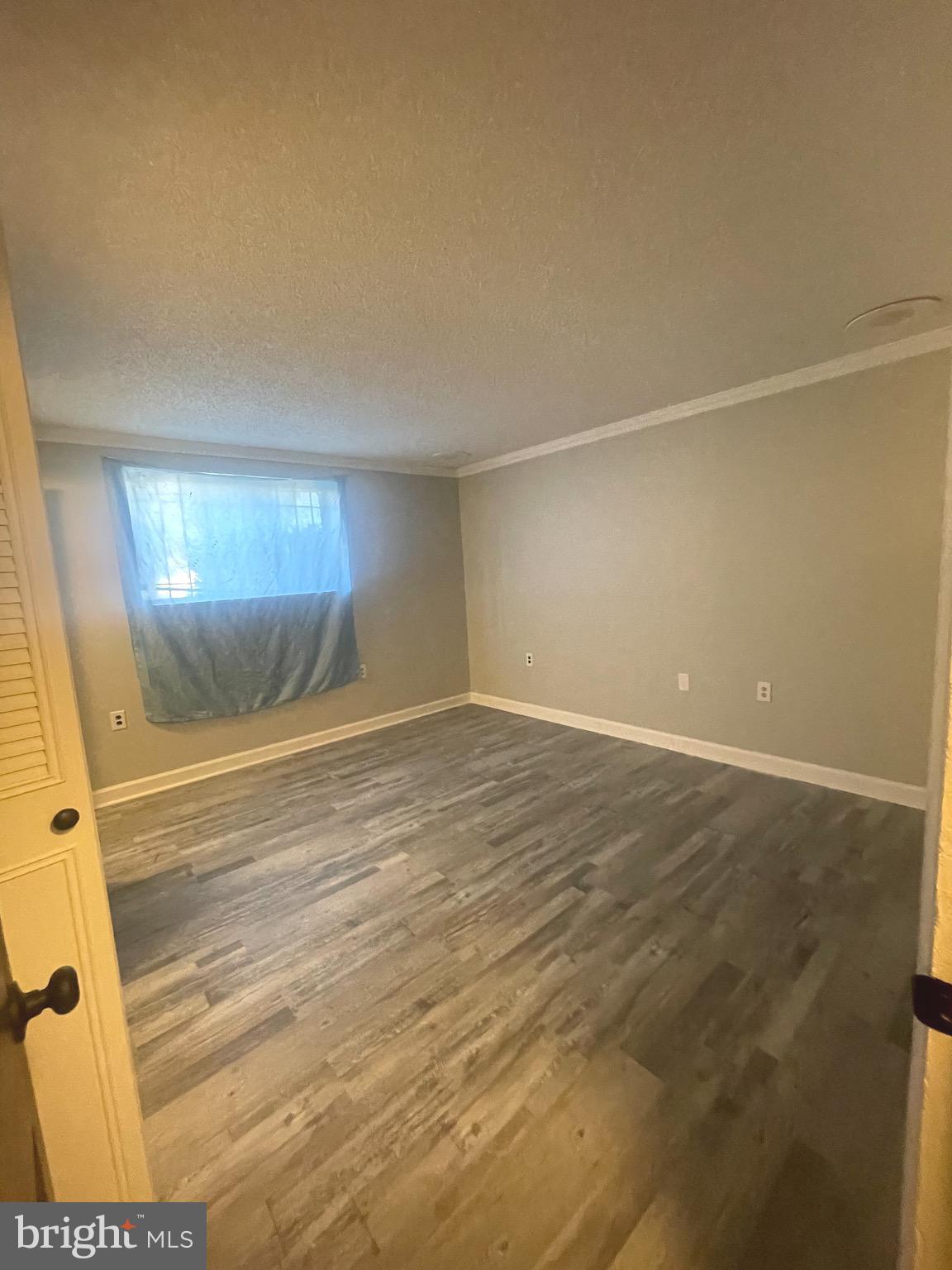 201 South Augusta Avenue, Unit A5 Baltimore, MD 21229 - Photo 10 of 12 a view of empty room