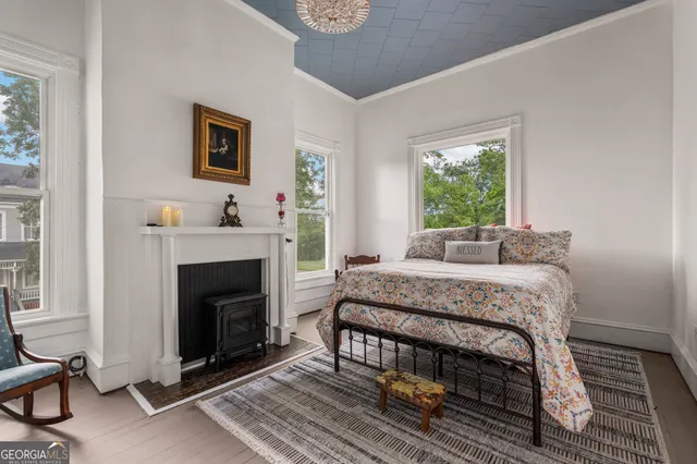 a bathroom with a toilet a sink and a mirror