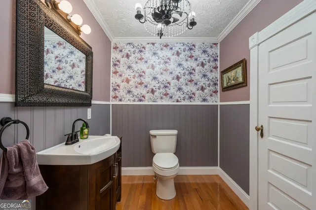 a bedroom with a bed and a fireplace