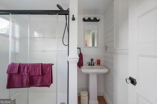 a bathroom with a toilet and a sink