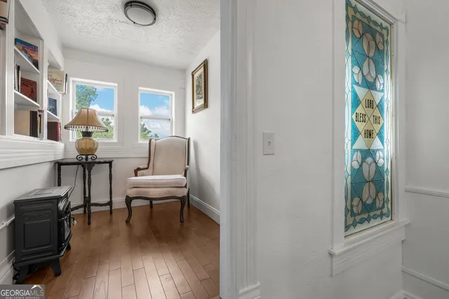 a utility room with dryer washer and a window