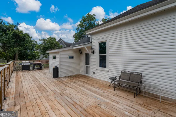 an aerial view of residential house with outdoor space and street view