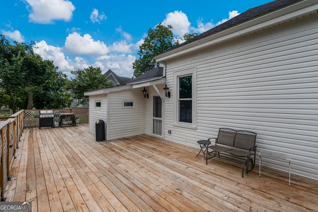 an aerial view of residential house with outdoor space and street view