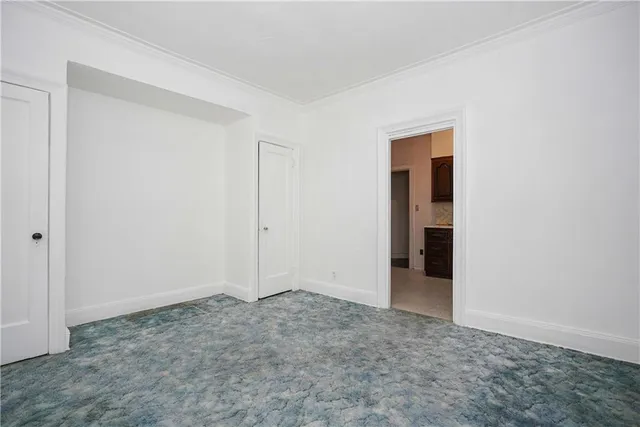 an empty room with an entryway