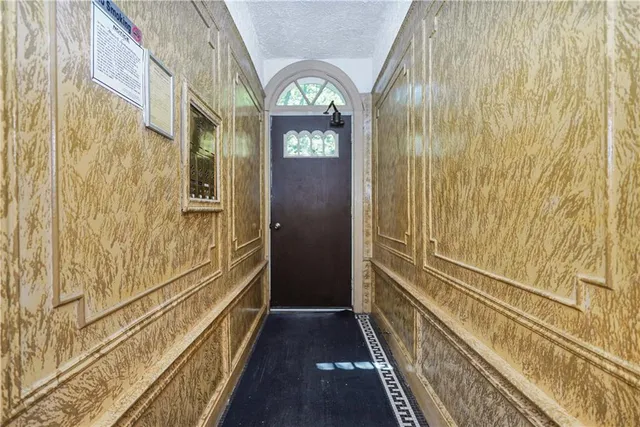 a view of balcony with wooden floor