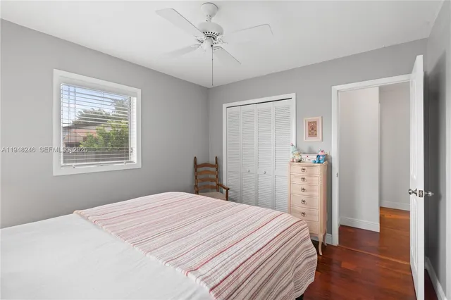 a bathroom with a double vanity sink and mirror