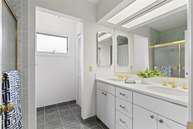 a bathroom with a shower and a toilet