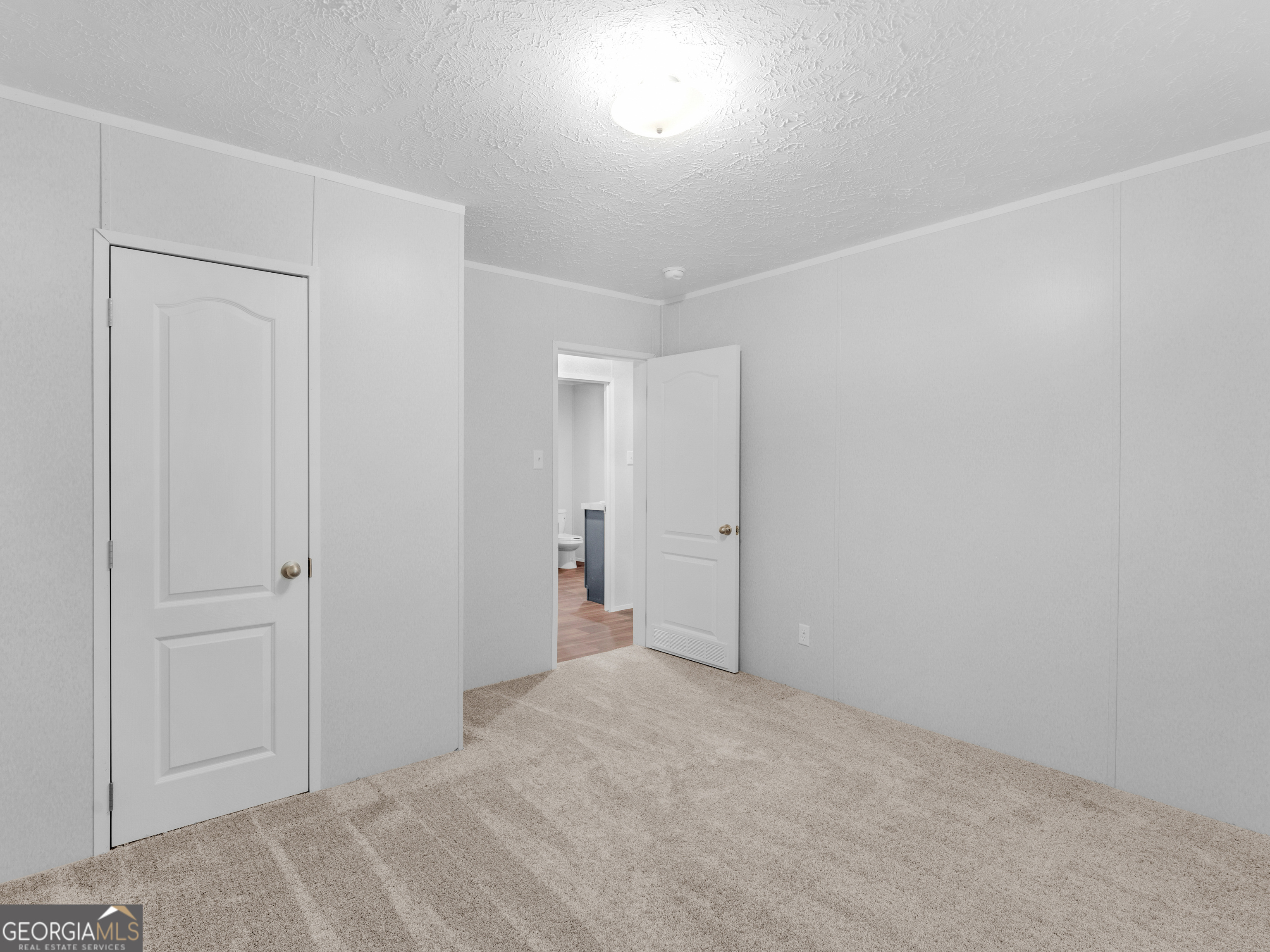 115 Gregory Lane Eatonton, GA 31024 - Photo 40 of 62 a view of an empty room