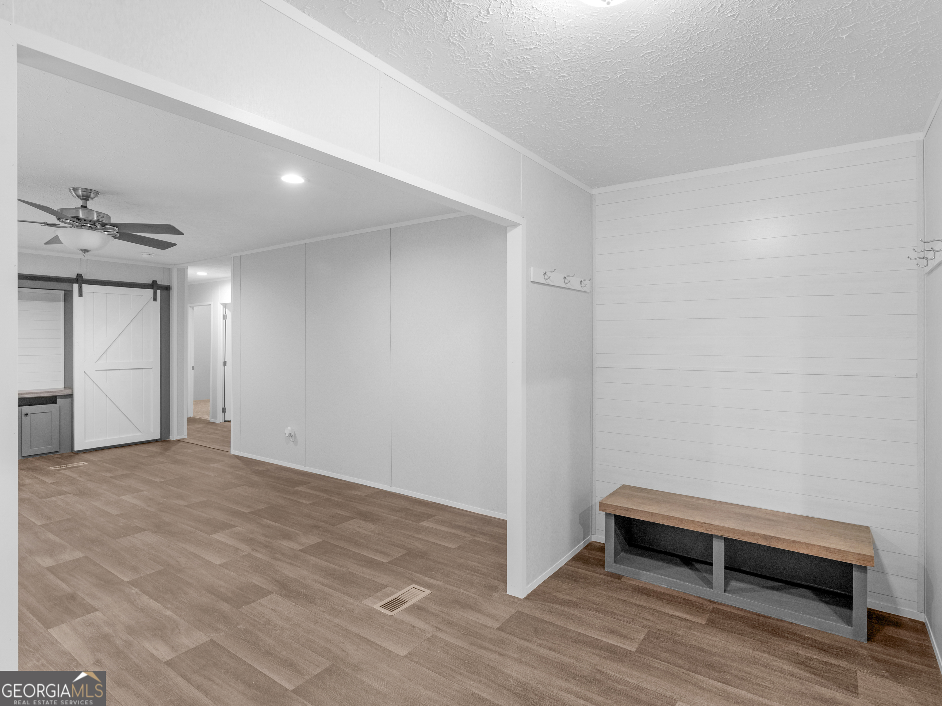 115 Gregory Lane Eatonton, GA 31024 - Photo 4 of 62 a view of a room with wooden floor