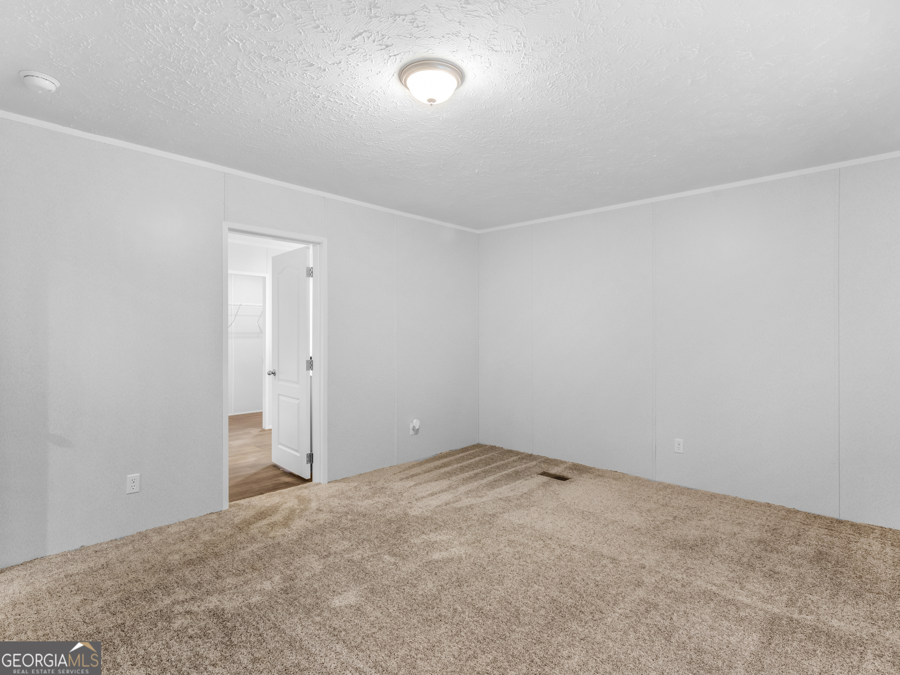 115 Gregory Lane Eatonton, GA 31024 - Photo 43 of 62 a view of an empty room