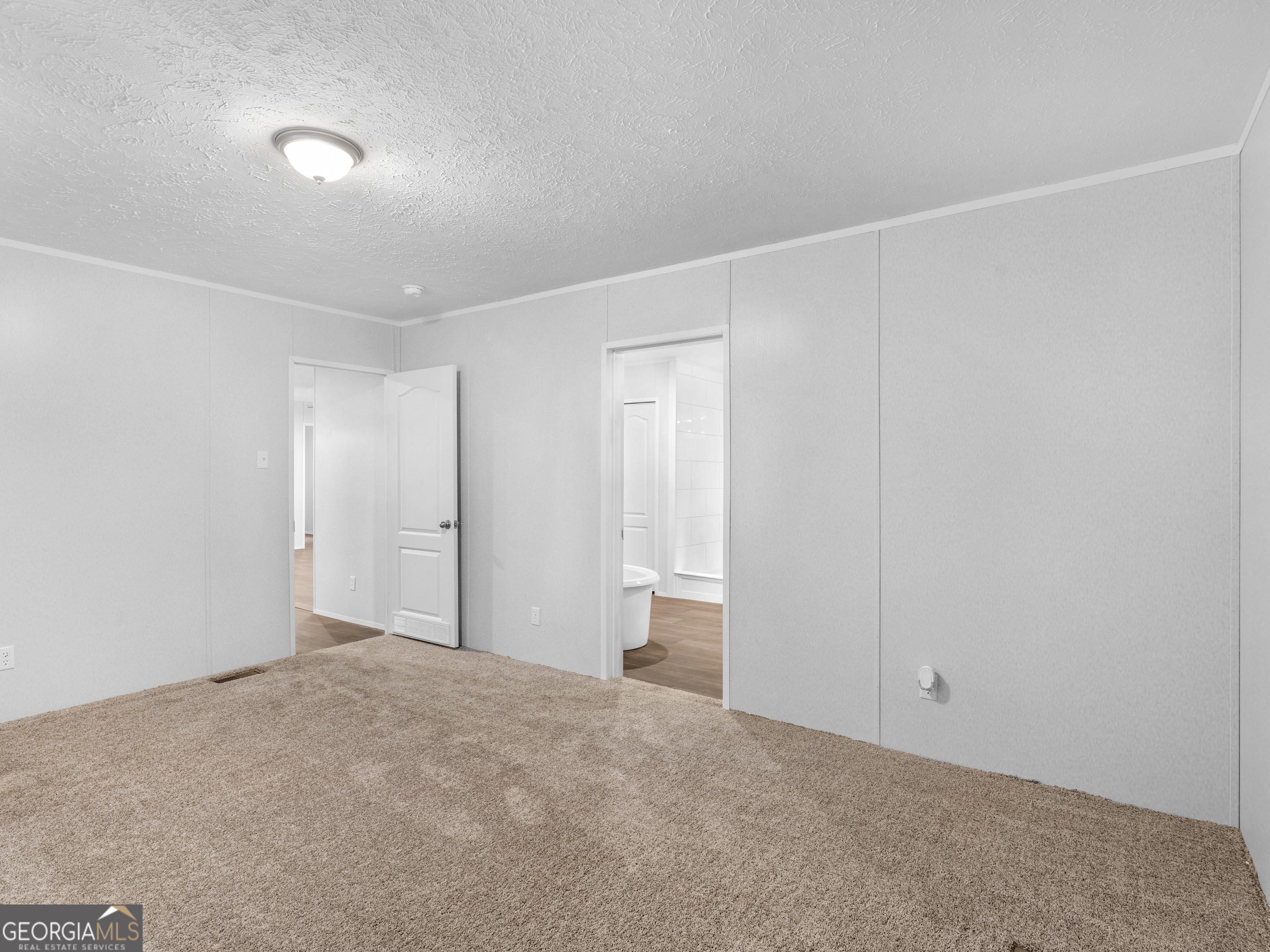 115 Gregory Lane Eatonton, GA 31024 - Photo 44 of 62 a view of an empty room