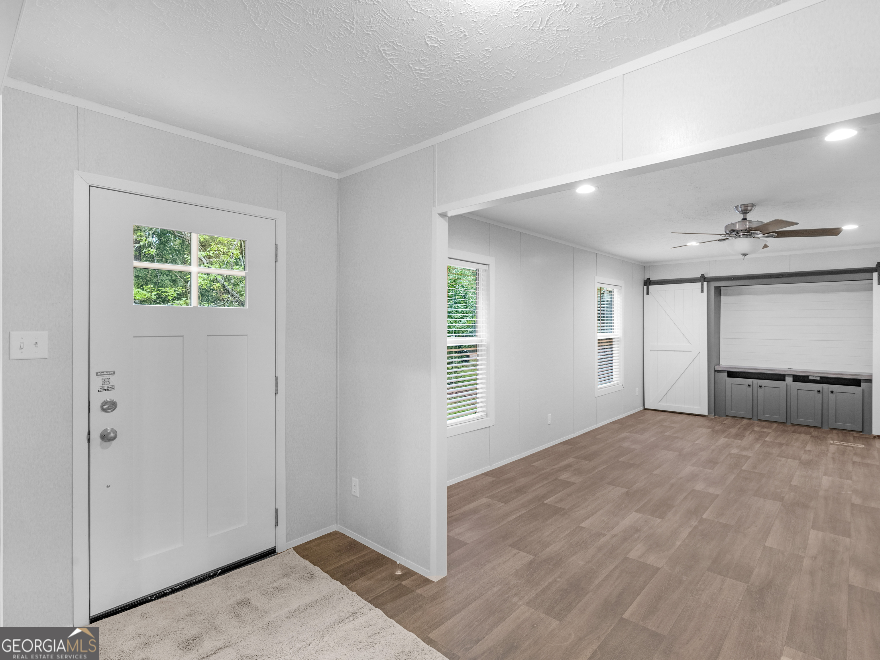 115 Gregory Lane Eatonton, GA 31024 - Photo 5 of 62 a view of an empty room with a window