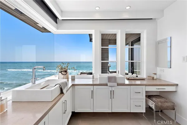 a living room with furniture a rug and a window