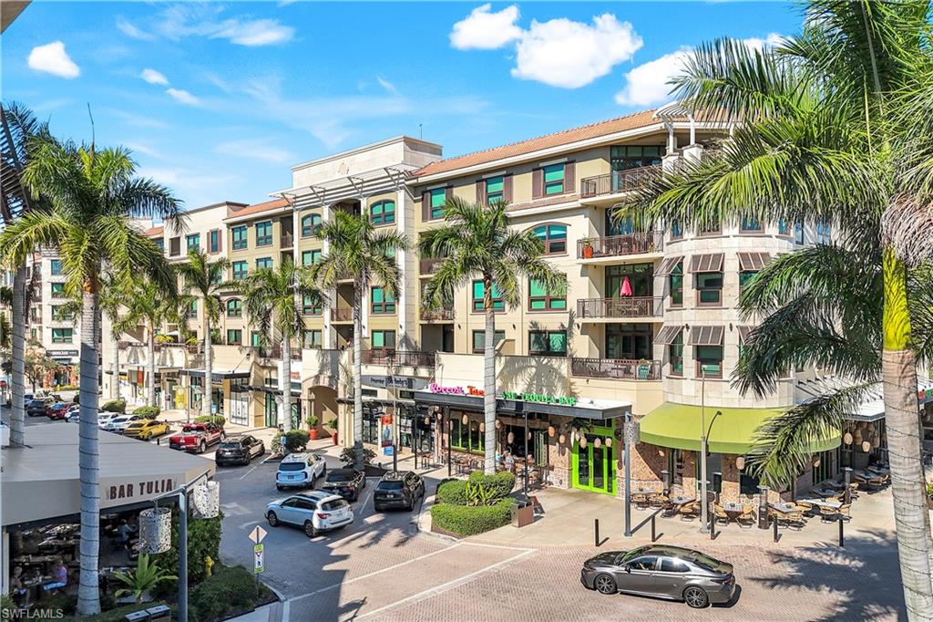 9115 Strada Place, Unit 5314 Naples, FL 34108 - Photo 37 of 44 a front view of a building with street view