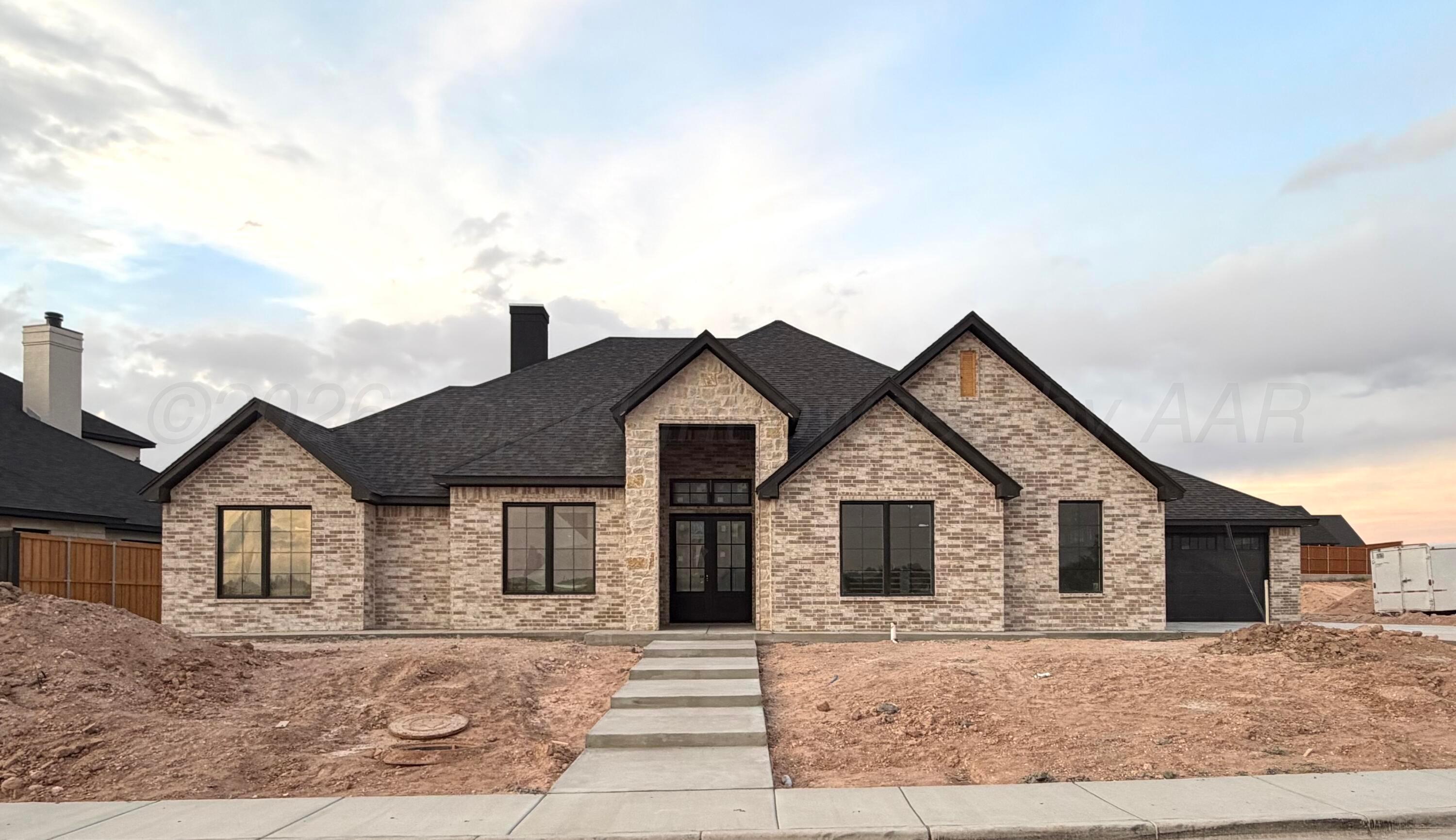 1106 Waggoner Ranch Road Amarillo, TX 79124 - Photo 1 of 2 a view of a house with a yard