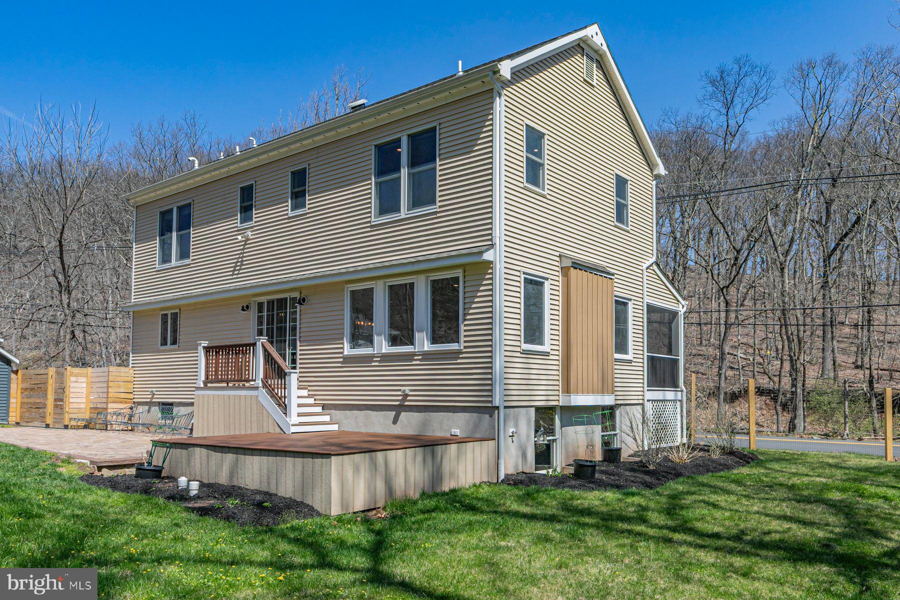 310 Hollow Road Skillman, NJ 08558 - Photo 29 of 32 a front view of a house with a yard