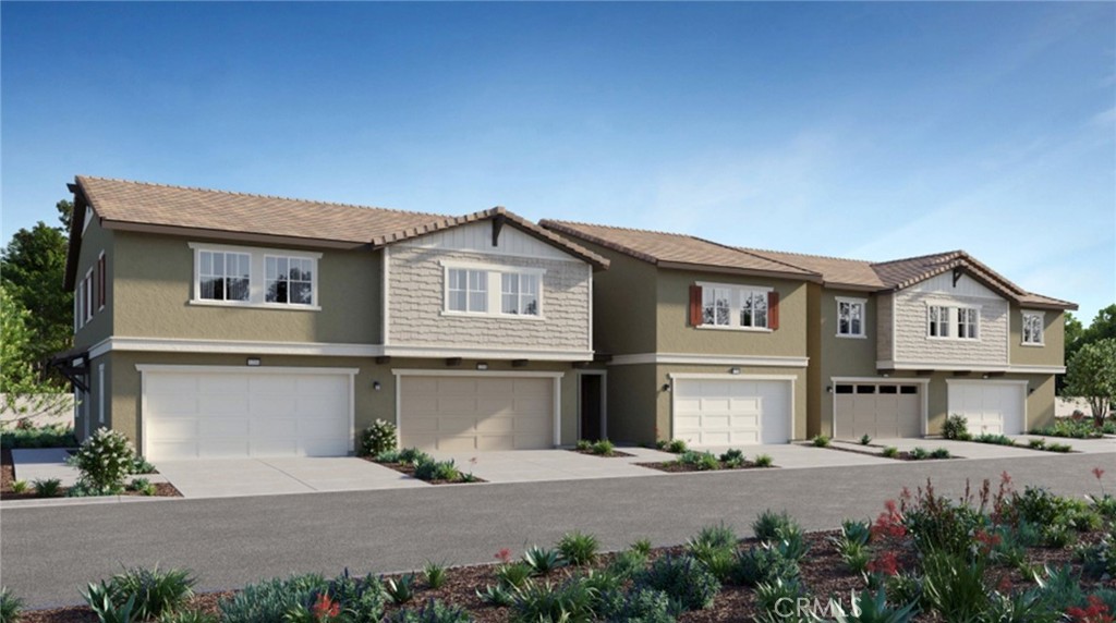 19227 Sequoia Grv Street Riverside, CA 92507 - Photo 1 of 1 a front view of a house with a yard and garage