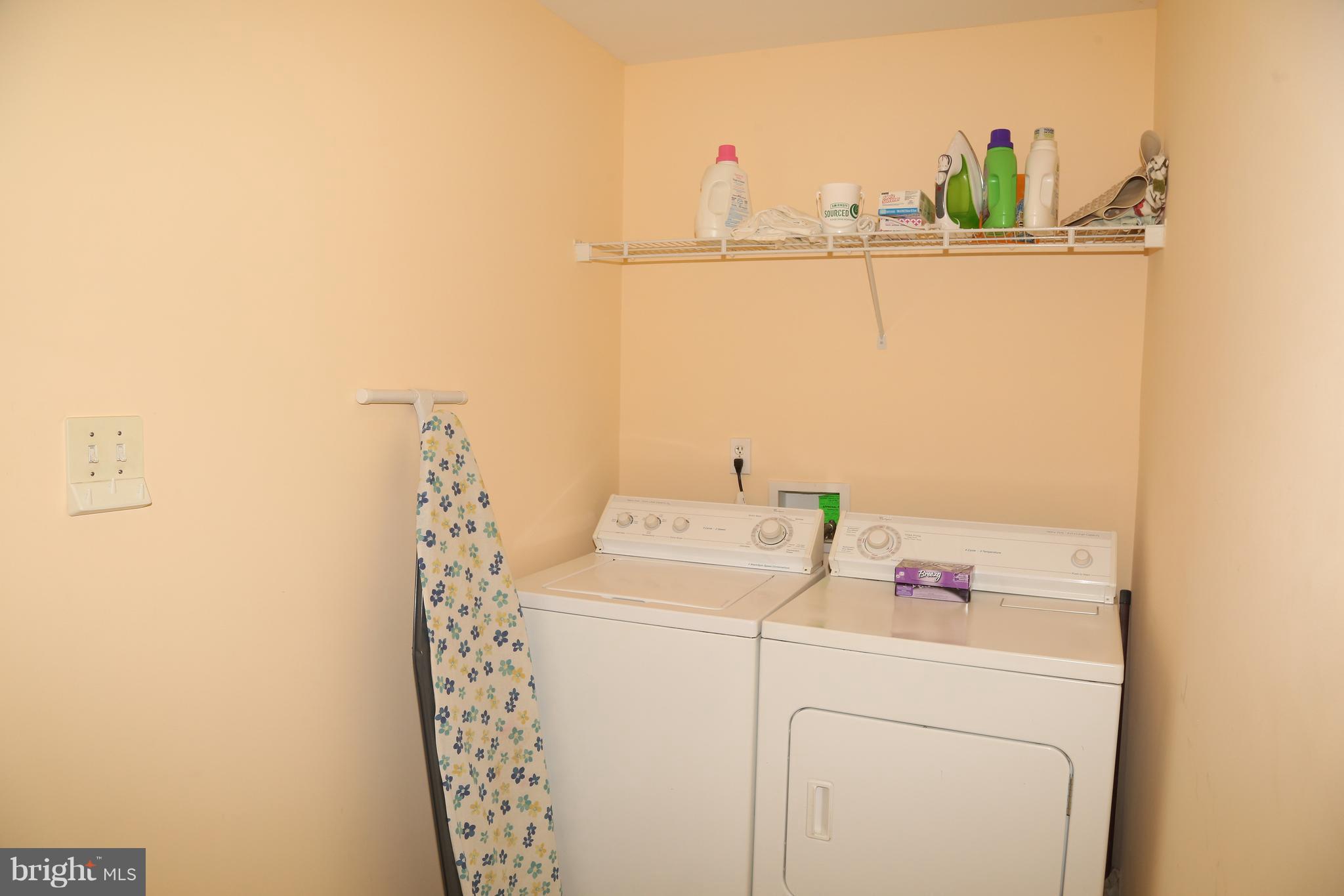 43 Falcon Bridge Road Ocean Pines, MD 21811 - Photo 27 of 30 a utility room with dryer and washer